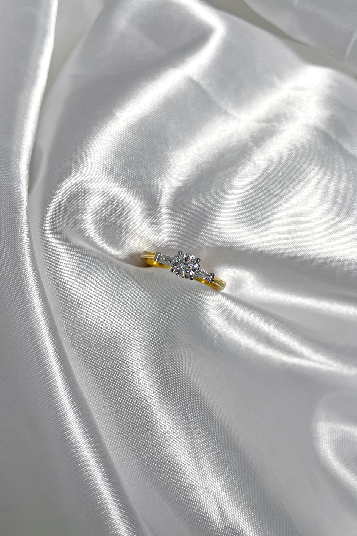0.53CT DIAMOND RING SET WITH TAPPER CUT DIAMONDS available at LeGassick Diamonds and Jewellery Gold Coast, Australia.