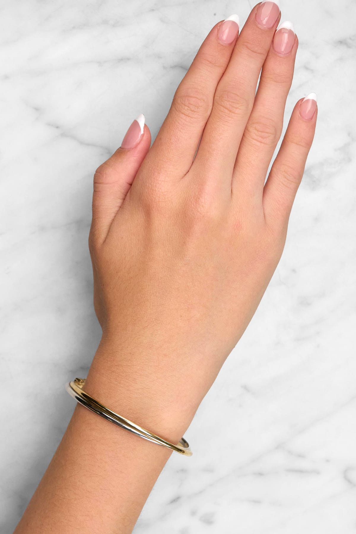 Elegant Fusion Crossover Hinged Bangle available from LeGassick Fine Jewellery.