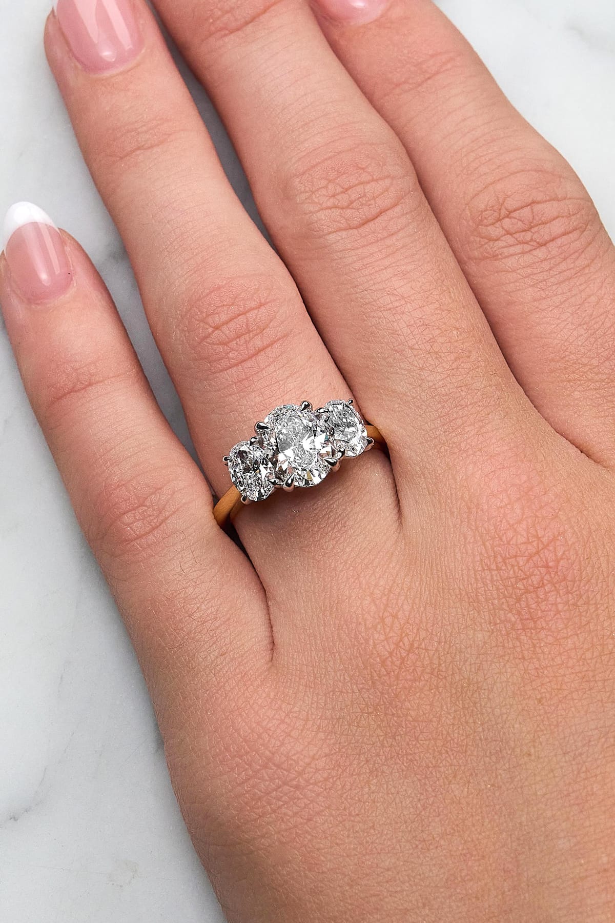 Rihanna.... 3.5 Carat Oval Lab Grown Diamond Trilogy Ring from The Madison Collection.