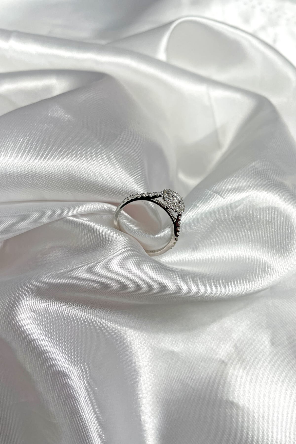 18 Carat Gold Double Oval Diamond Halo Engagement Ring With Diamond Band available at LeGassick Diamonds and Jewellery Gold Coast, Australia.