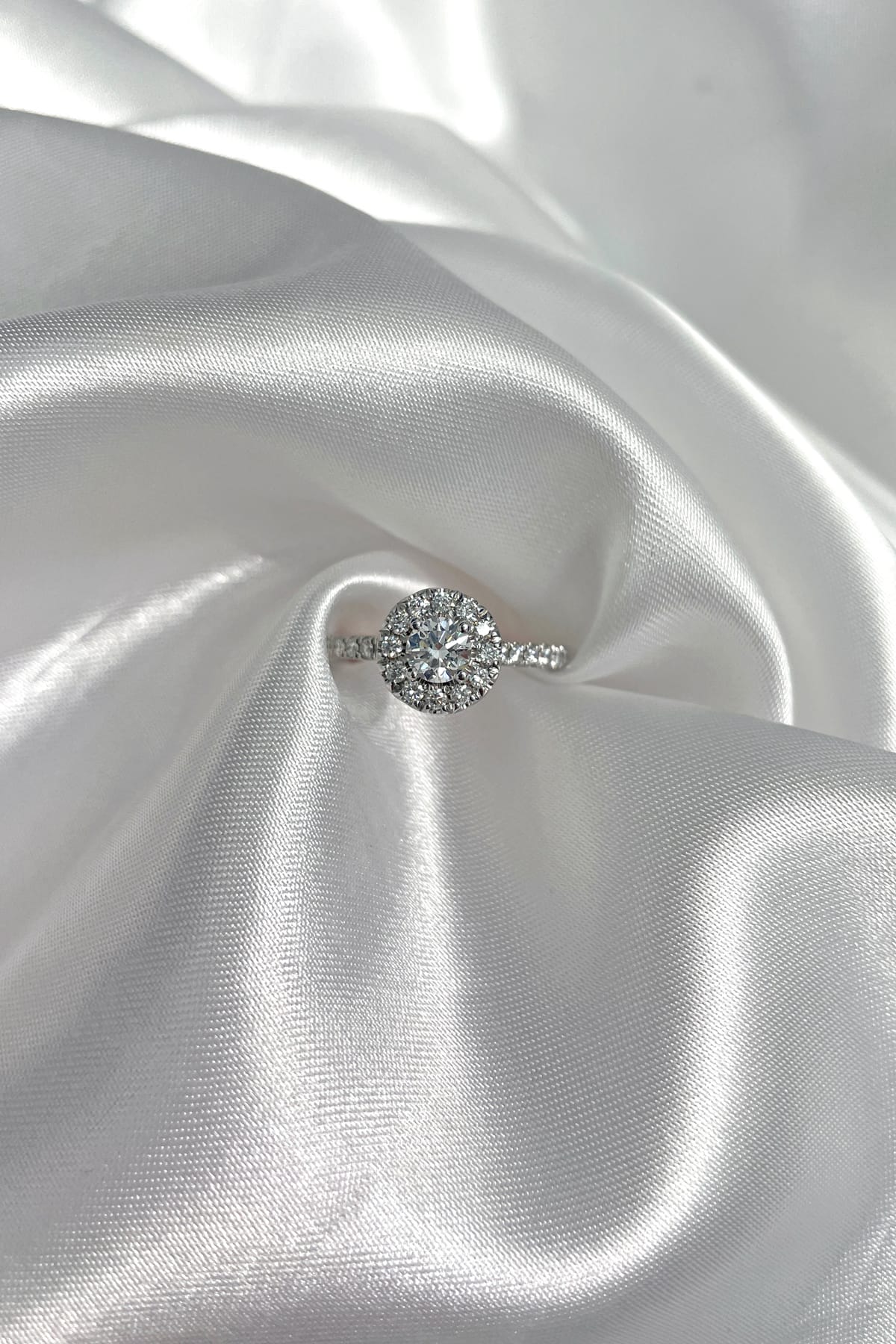 18 Carat Gold With 0.40 Carat Round Diamond Halo Engagement Ring available at LeGassick Diamonds and Jewellery Gold Coast, Australia.