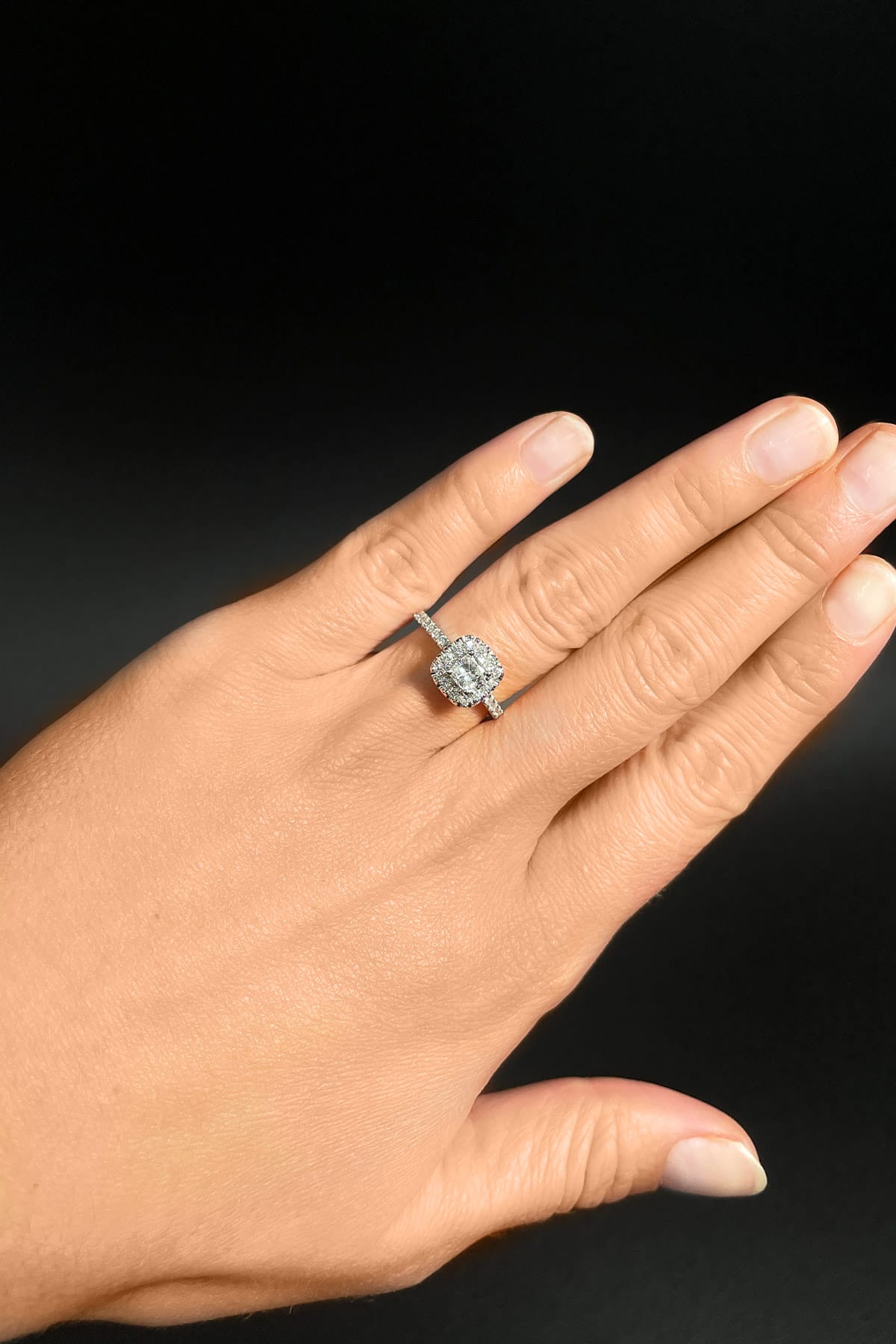18 carat white gold 0.50ct cushion cut diamond halo ring available at LeGassick Diamonds and Jewellery Gold Coast, Australia