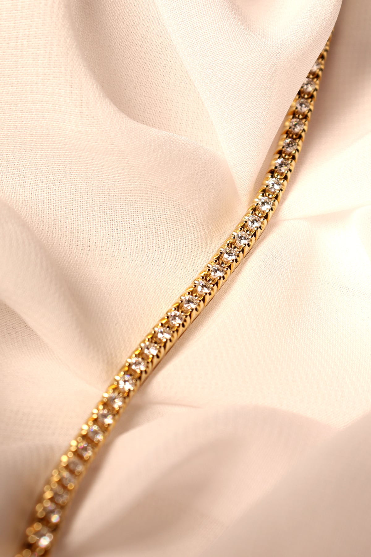 2 Carat Diamond Tennis Bracelet in 9ct Yellow Gold available at LeGassick Diamonds and Jewellery Gold Coast, Australia.