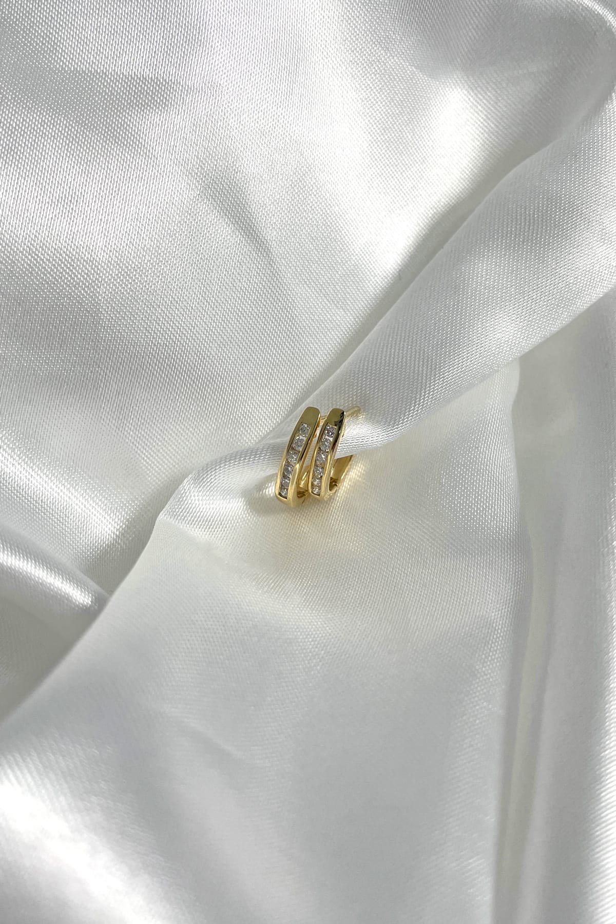 9ct Yellow Gold Diamond Set Oval Hoop Earrings at LeGassick Diamonds & Jewellery.