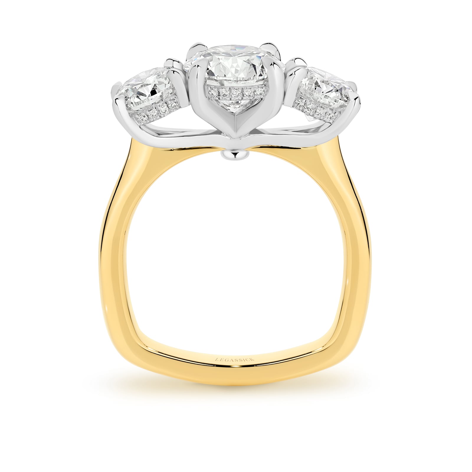 Abbagail is a stunning diamond trilogy ring with over 4 carats of spectacular round brilliant diamonds and a hidden diamond halo. She was designed and handcrafted by LeGassick's Master Jewellers and a member of the Beyond Luxury Collection.