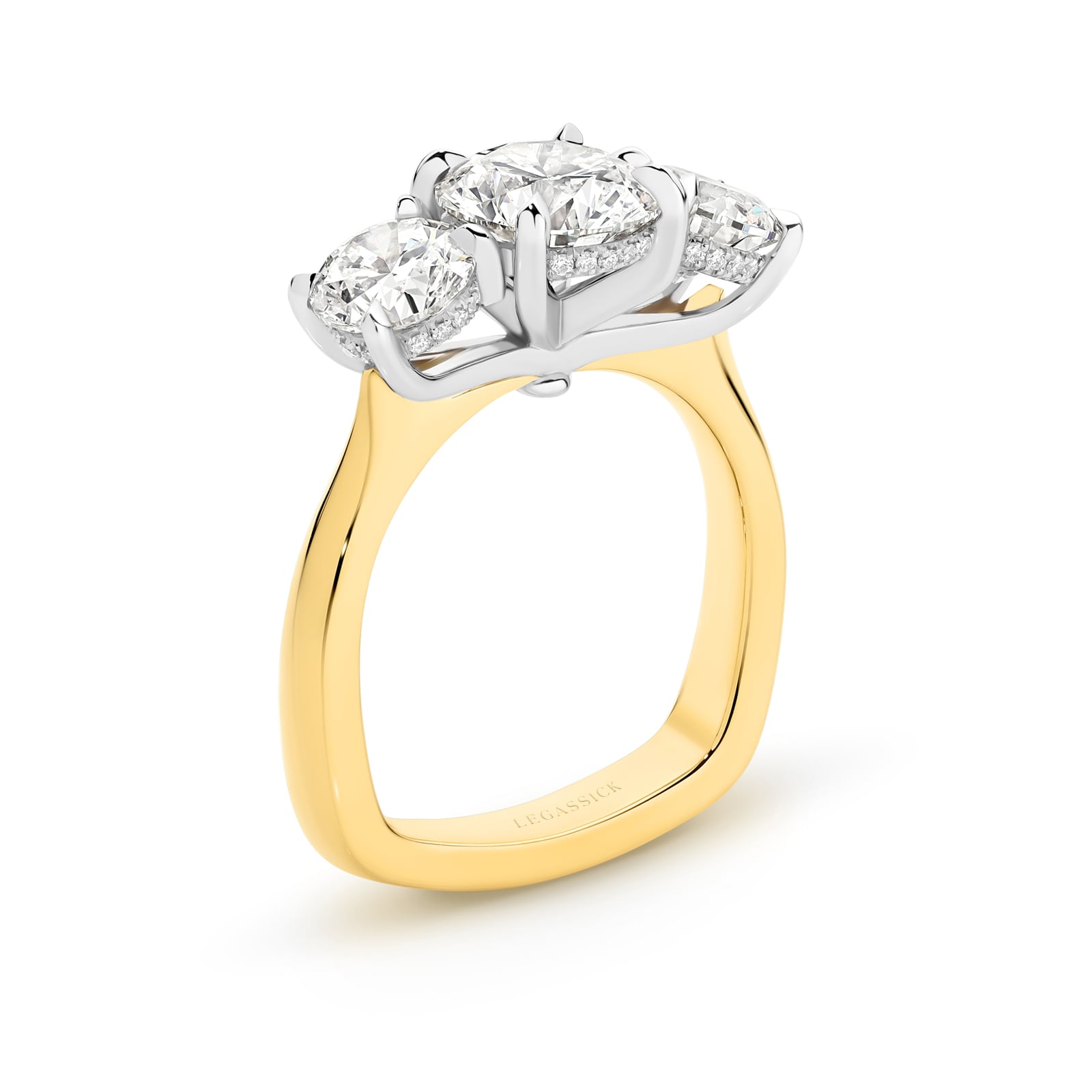 Abbagail is a stunning diamond trilogy ring with over 4 carats of spectacular round brilliant diamonds and a hidden diamond halo. She was designed and handcrafted by LeGassick's Master Jewellers and a member of the Beyond Luxury Collection.