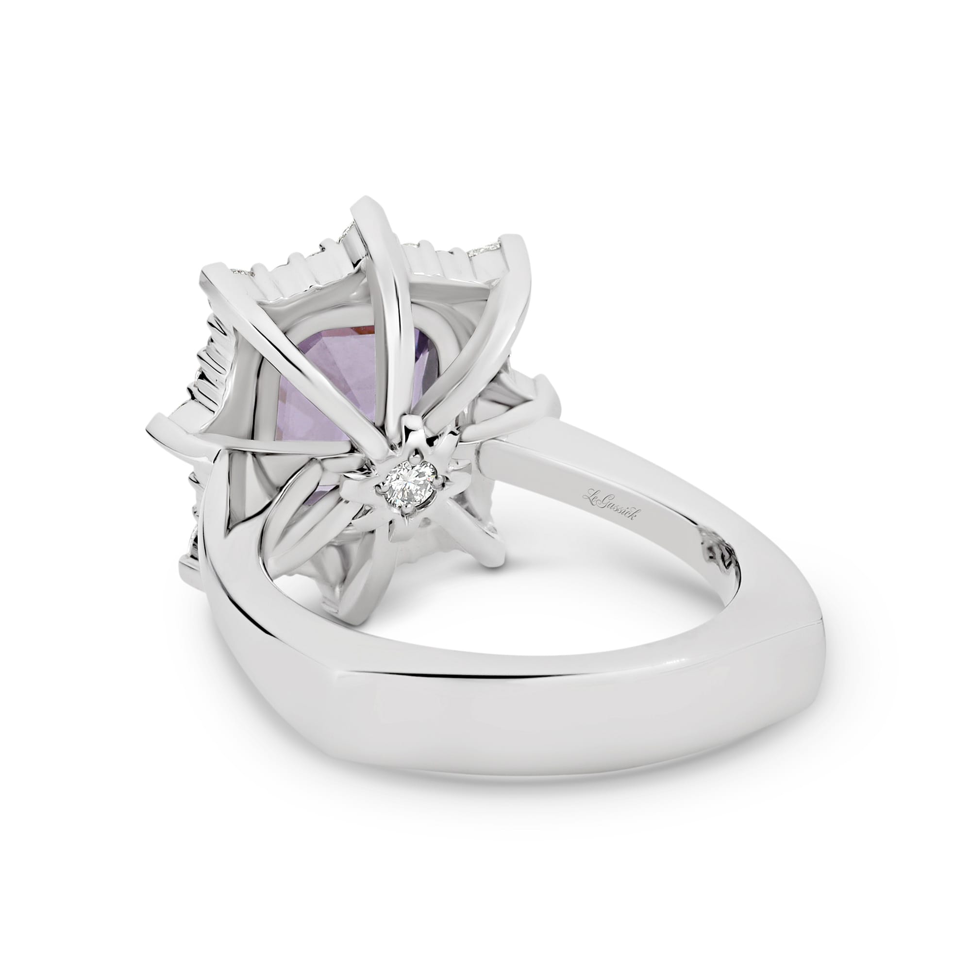 Alexandra features a 3.74 carat fusion cut Lavender Spinel centre gemstone. The centre stone sits upon a rose gold cradle and is encased with a diamond halo crown. She was designed and handcrafted by LeGassick's Master Jewellers, Gold Coast, Australia.