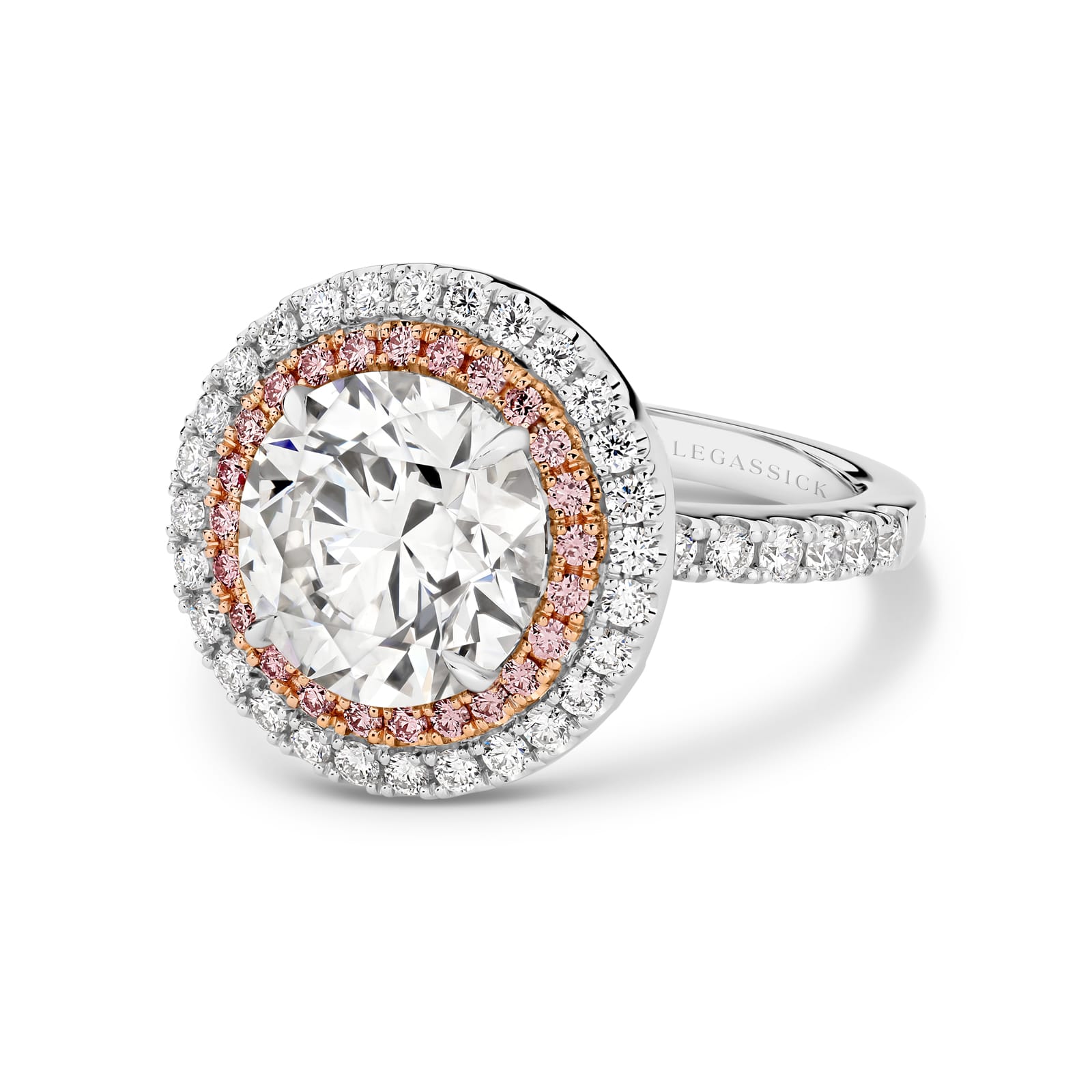 Cleopatra has a stunning 4.51ct round brilliant cut centre diamond surrounded by an inner halo of 24 rare, natural Argyle pink diamonds that, in turn, are showcased by an outer halo of fine white diamonds. She was designed and handcrafted by LeGassick's Master Jewellers, Gold Coast, Australia.
