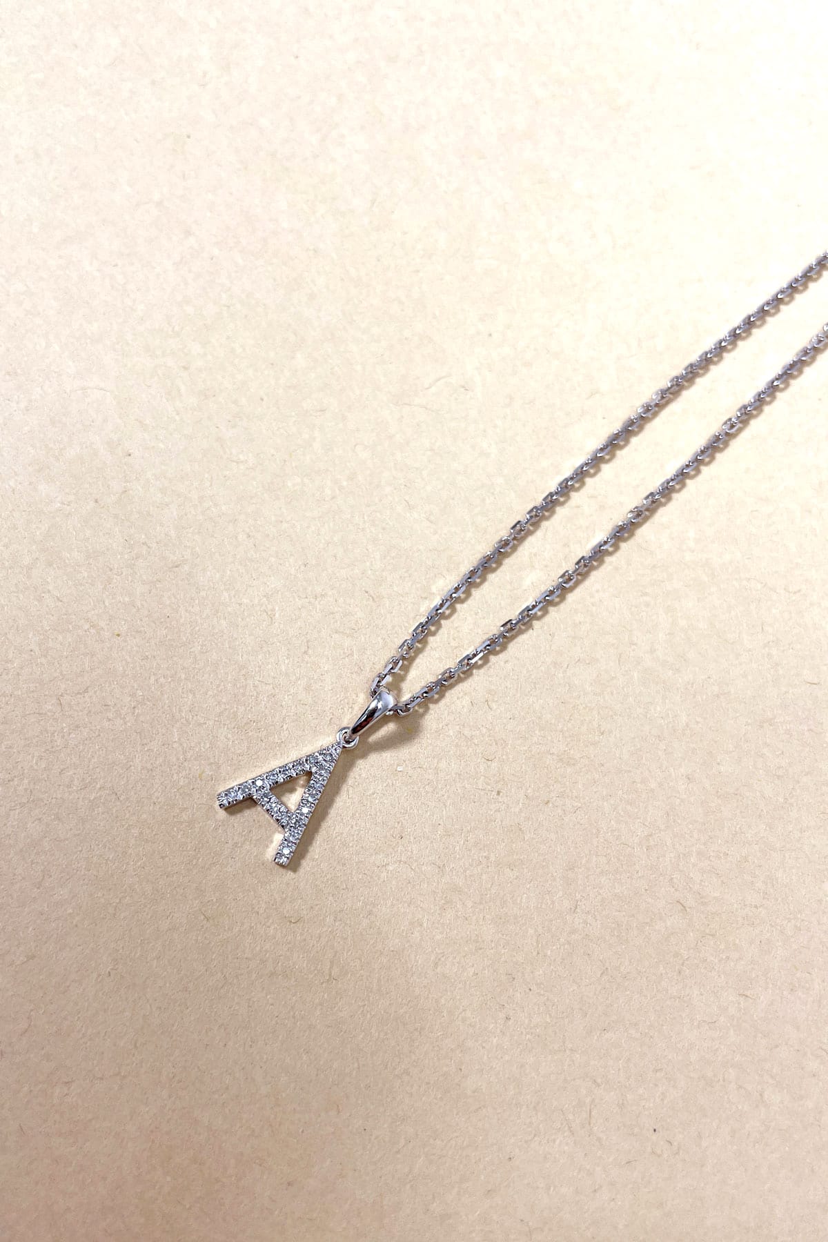 9 Carat White Gold Diamond Set Initial Pendant available at LeGassick Diamonds and Jewellery Gold Coast, Australia.