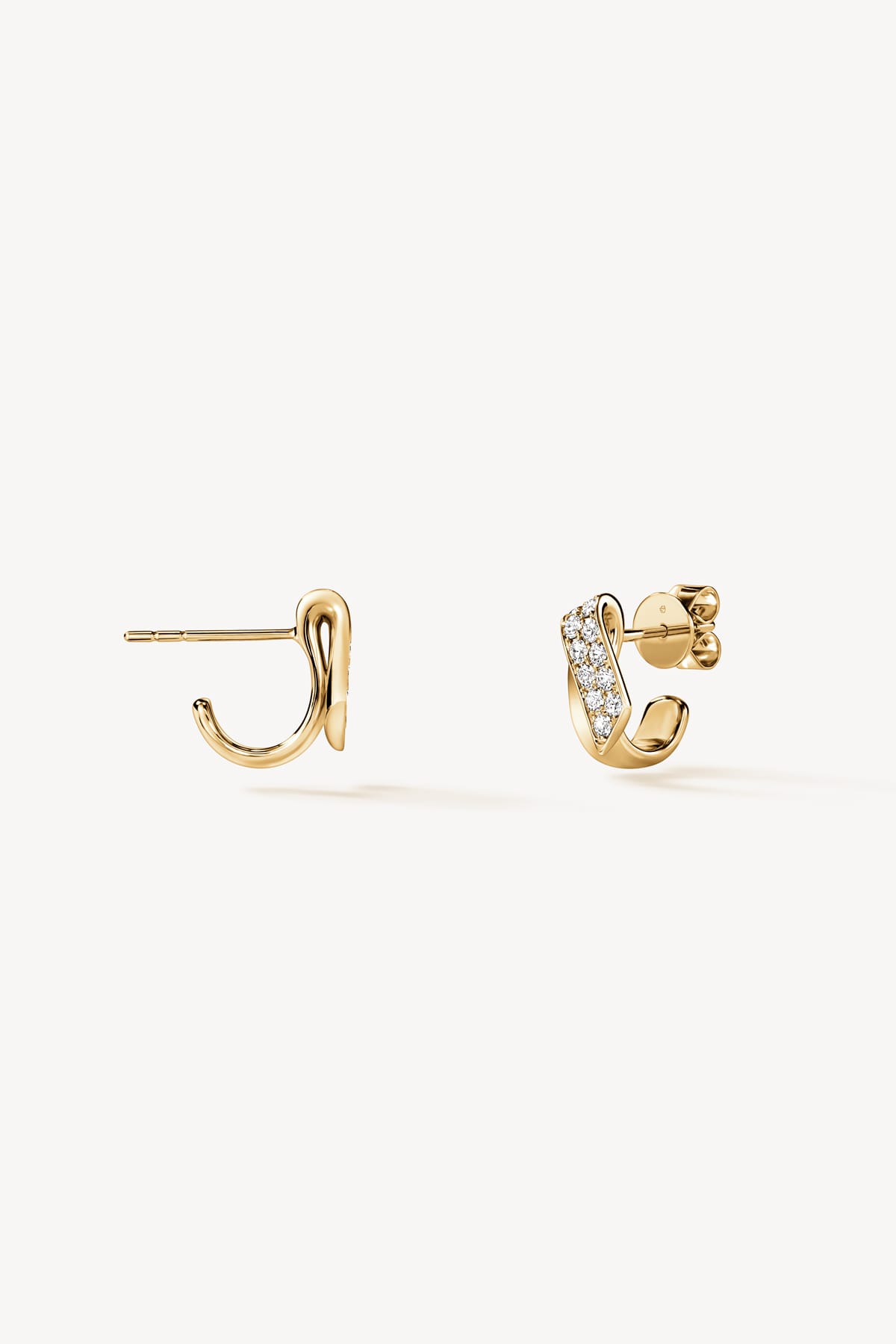 Inside Out Diamond Flip Huggies in Yellow Gold from Hearts On Fire available from LeGassick Fine Jewellery.