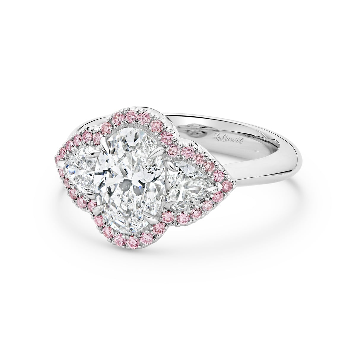 Katerina is a white & pink diamond ring with a 2 carat oval centre stone. She was designed and handcrafted by LeGassick's Master Jewellers, Gold Coast, Australia.