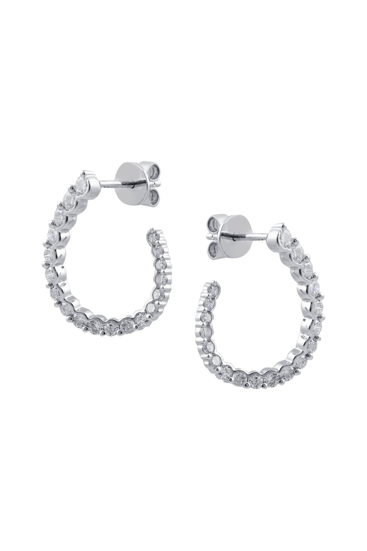 Offset Oval Half Twist Diamond Earrings In White Gold available from LeGassick Jewellery, Gold Coast, Australia. Showrooms at Pacific Fair and Runaway Bay Centre.