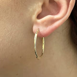 Round to Flat Hoop Earrings In 9 Carat Yellow Gold available from LeGassick Fine Jewellery, Gold Coast, Australia. Showrooms at Pacific Fair and Runaway Bay Centre.