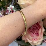 Solid 9 Carat Yellow Gold 5mm Wide Bangle available at LeGassick Diamonds and Jewellery Gold Coast, Australia.