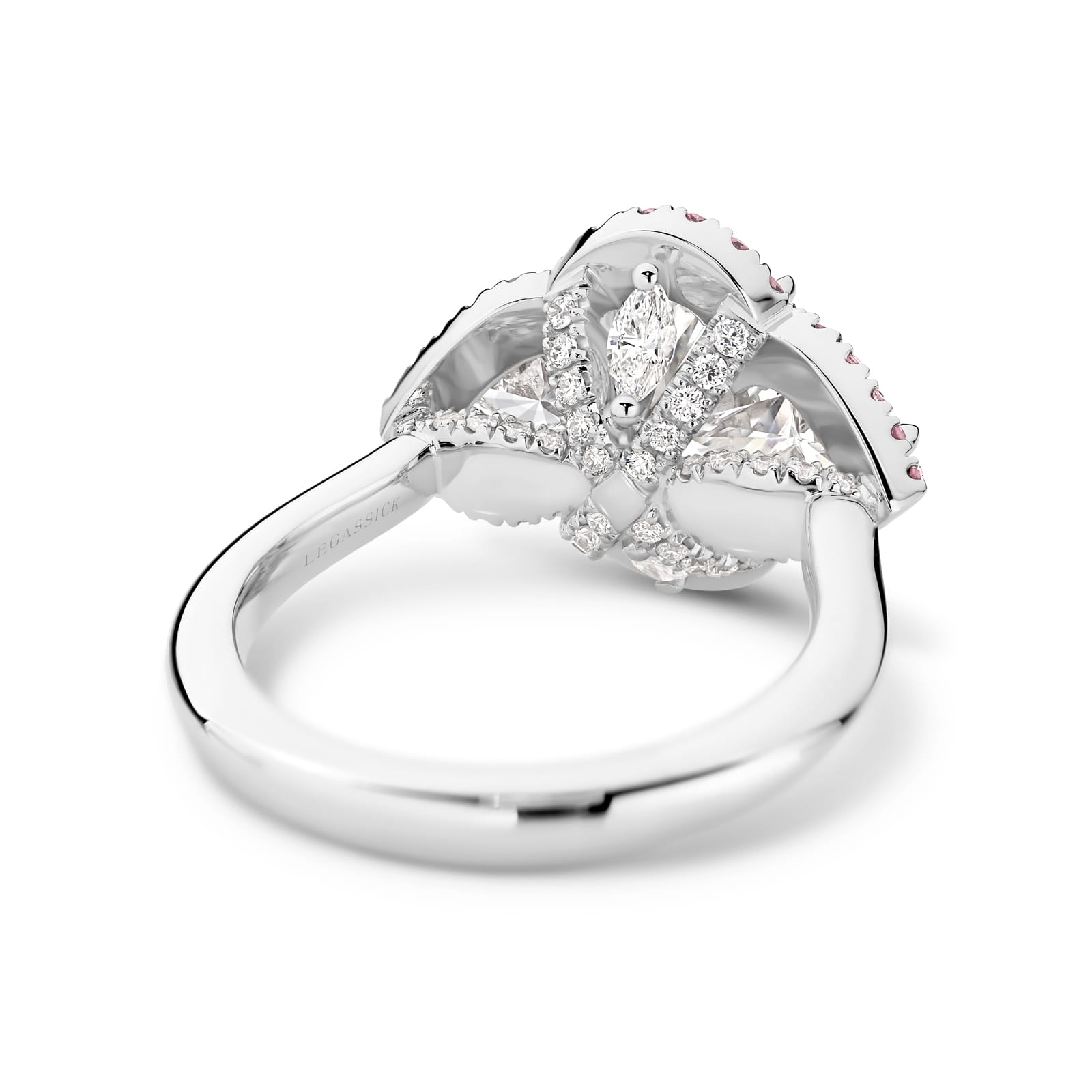 Katerina is a white & pink diamond ring with a 2 carat oval centre stone. She was designed and handcrafted by LeGassick's Master Jewellers, Gold Coast, Australia.