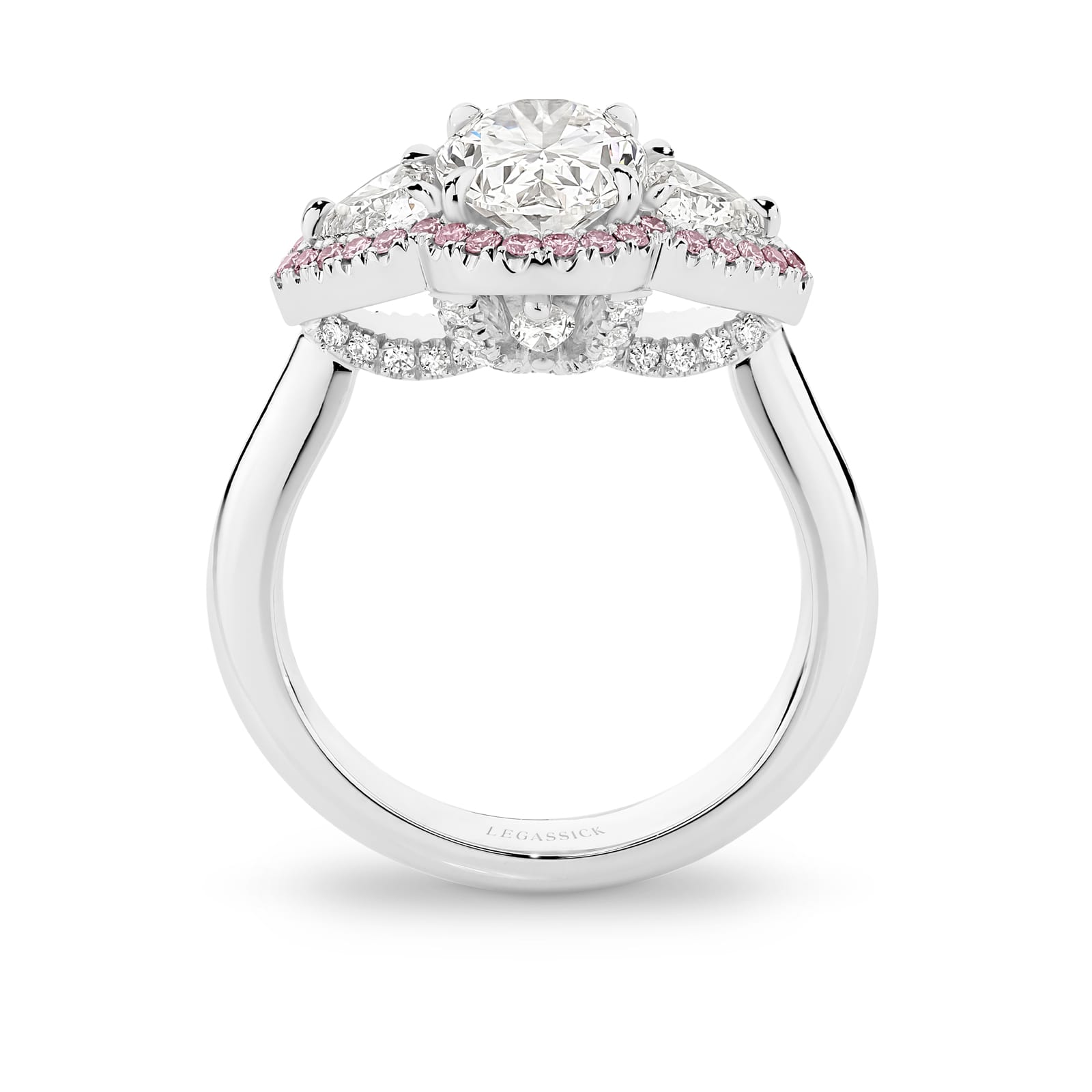Katerina is a white & pink diamond ring with a 2 carat oval centre stone. She was designed and handcrafted by LeGassick's Master Jewellers, Gold Coast, Australia.