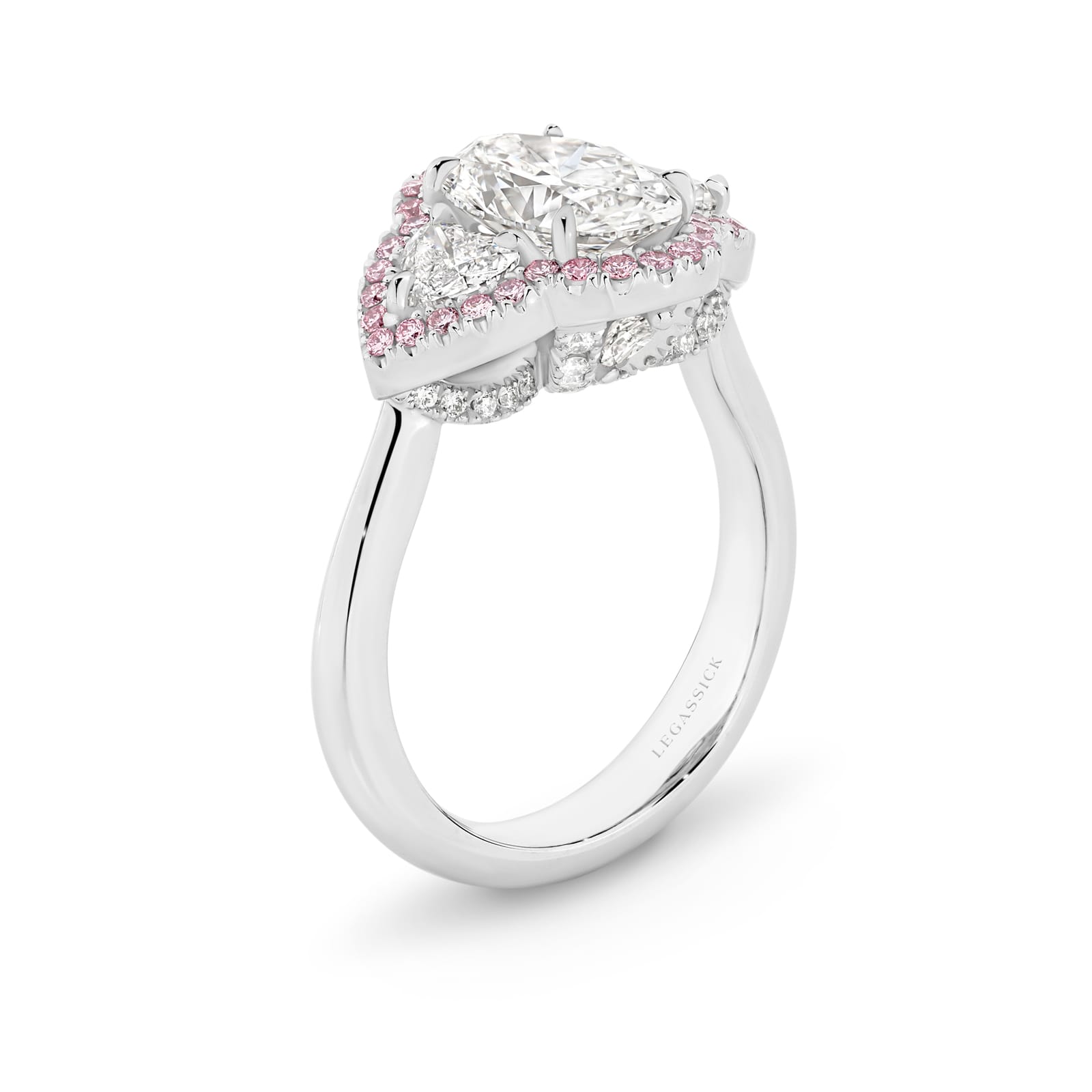Katerina is a white & pink diamond ring with a 2 carat oval centre stone. She was designed and handcrafted by LeGassick's Master Jewellers, Gold Coast, Australia.