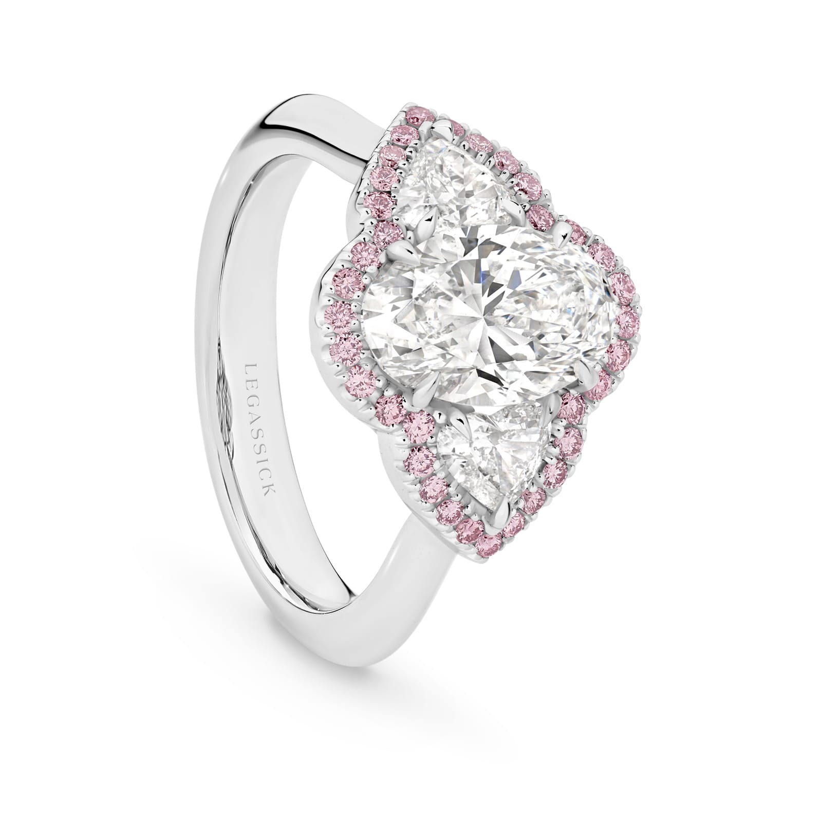 Katerina is a white & pink diamond ring with a 2 carat oval centre stone. She was designed and handcrafted by LeGassick's Master Jewellers, Gold Coast, Australia.