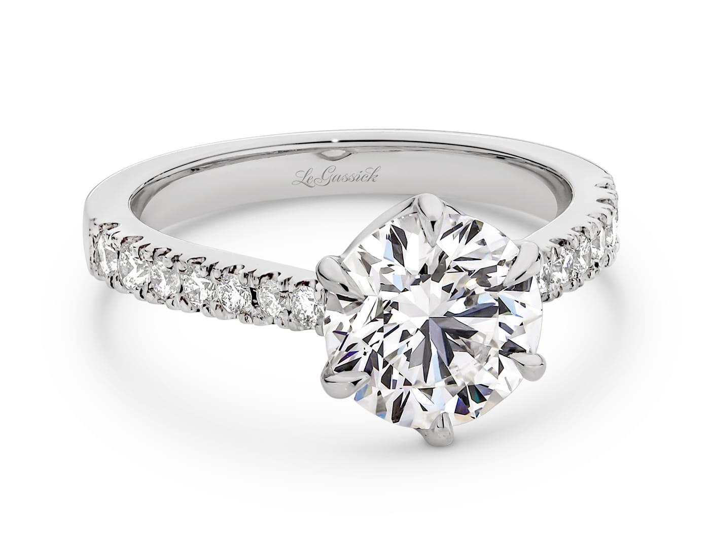 Milena features a 2.01 carat round brilliant cut white diamond at her centre. She is supported with a total of 14 round brilliant cut diamonds down her shoulders. She was designed and handcrafted by LeGassick's Master Jewellers, Gold Coast, Australia.