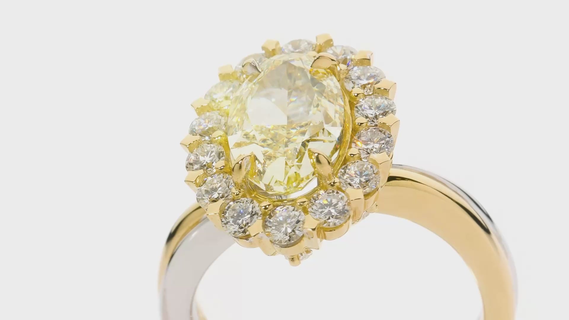 Vincent is a 2.51ct VSI Oval Natural Fancy Yellow Diamond ring created by LeGassick Fine Jewellery, Gold Coast, Australia.