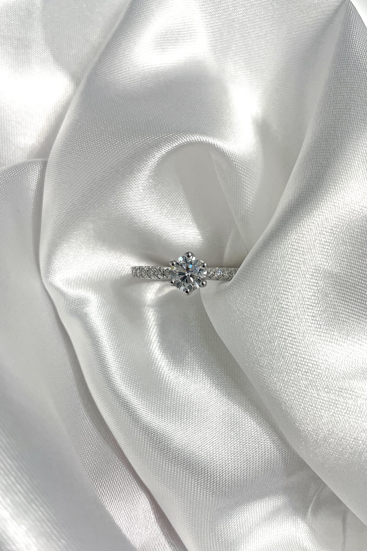 18 Carat Gold And 0.70 Carat Diamond Engagement Ring with Diamond Band available at LeGassick Diamonds and Jewellery Gold Coast, Australia.