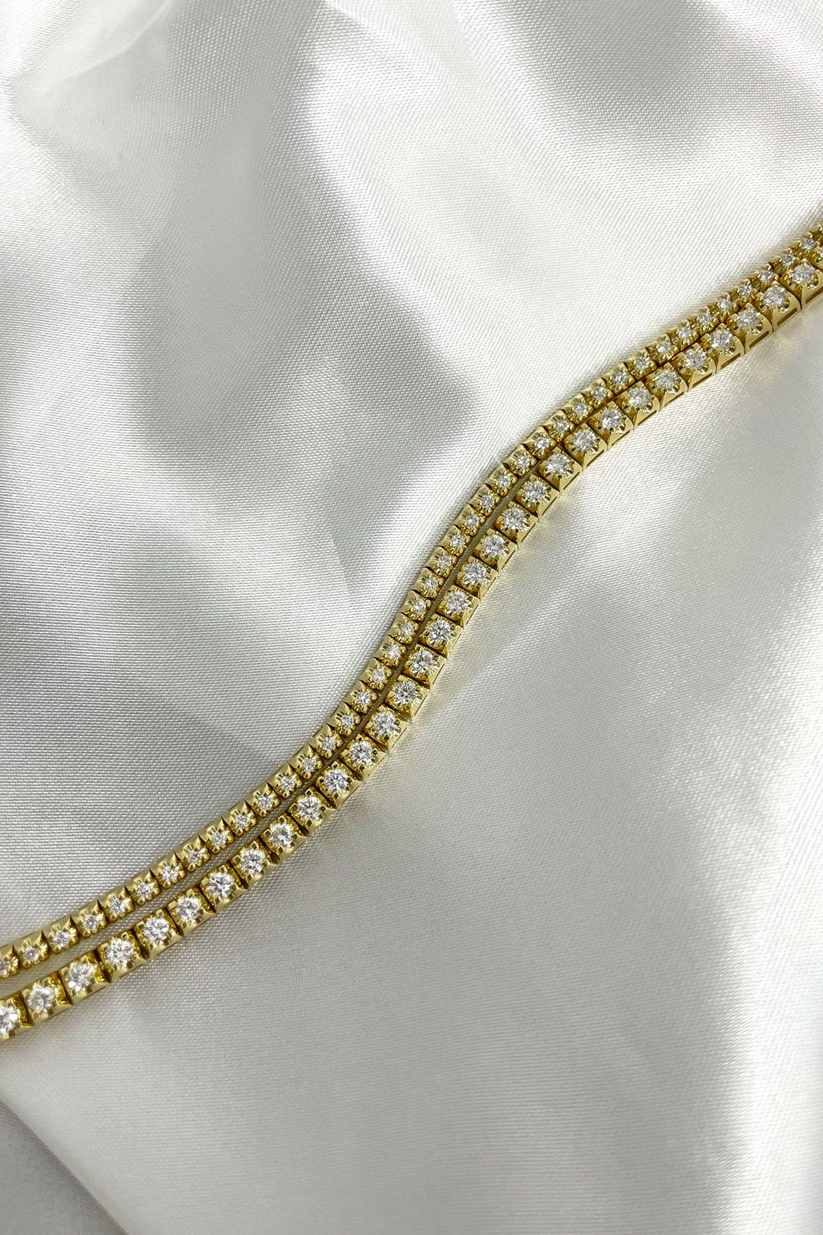 Diamond Tennis Bracelets in 9ct Yellow Gold available at LeGassick Diamonds and Jewellery Gold Coast, Australia.