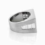 White gold ring with diamond stones on a white background