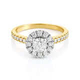 Gold ring with a diamond halo on a white background