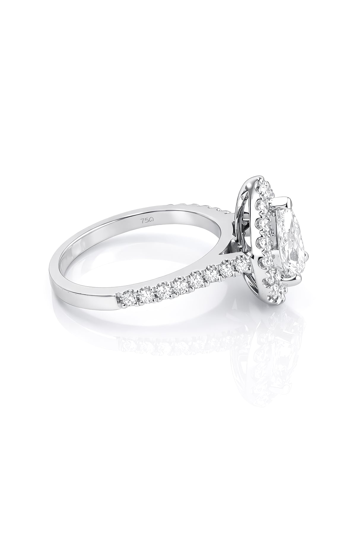 Diamond ring with a pear-shaped centre stone and diamond halo on a white background