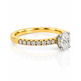 Oval Cut Diamond Solitaire Engagement Ring with Diamond Set Shoulders in Yellow Gold