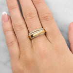 Lady wearing a Multi-Layer Diamond Ring set in 18ct Yellow Gold