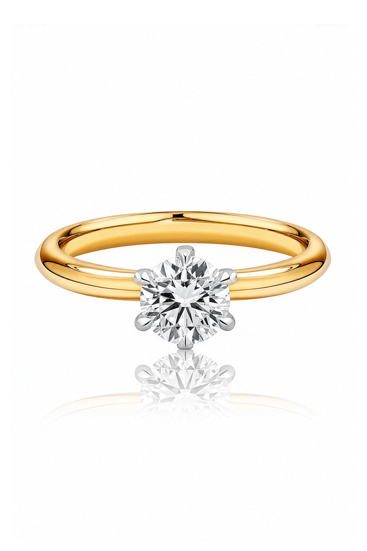 Gold ring with a diamond on a white background