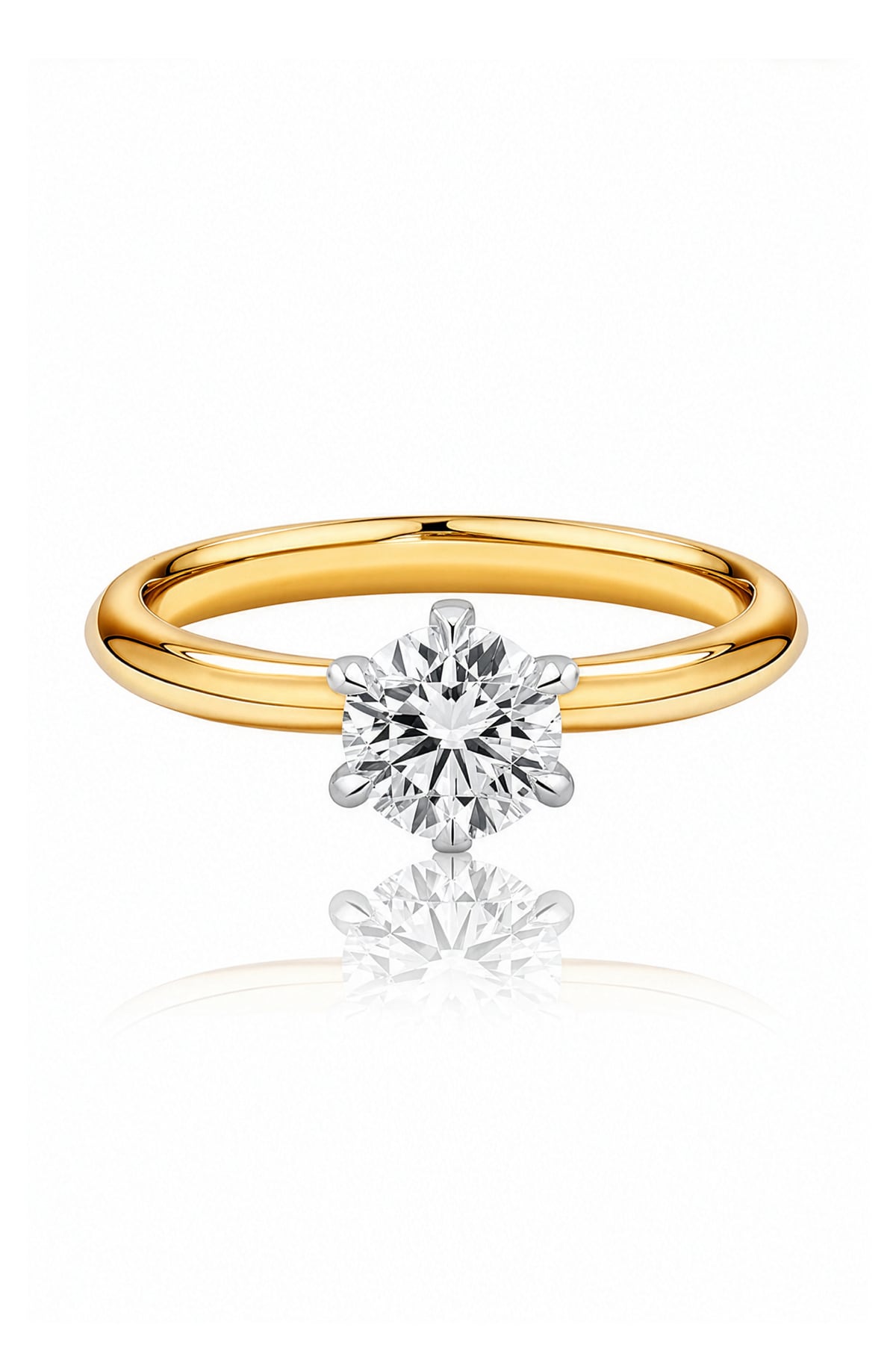 Gold ring with a diamond on a white background