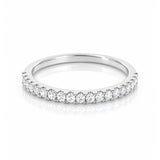 White Gold band with small diamonds on a white background