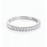 White Gold band with small diamonds on a white background