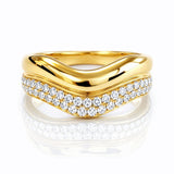 Gold ring with diamond accents on a white background