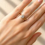 hand wearing a Wrap Style Diamond Ring in 18ct Yellow & White Gold on a white background