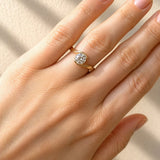 hand wearing a Wrap Style Diamond Ring in 18ct Yellow & White Gold on a white background