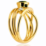 Gold ring with green gemstone and smaller diamond on a white background at LeGassick.