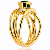 Gold ring with green gemstone and smaller diamond on a white background at LeGassick.