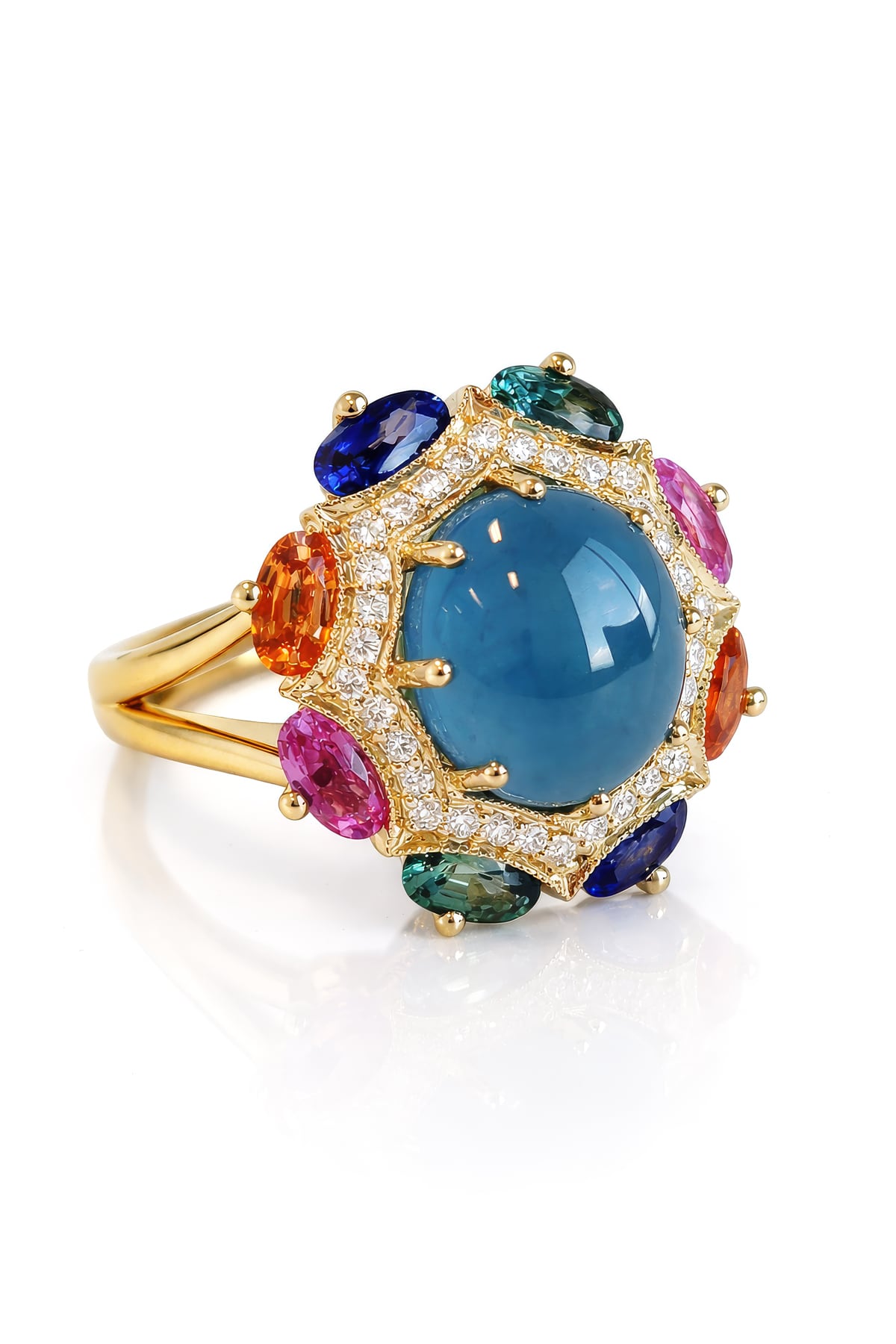 Luxury ring with a blue gemstone and multicolored stones on a white background