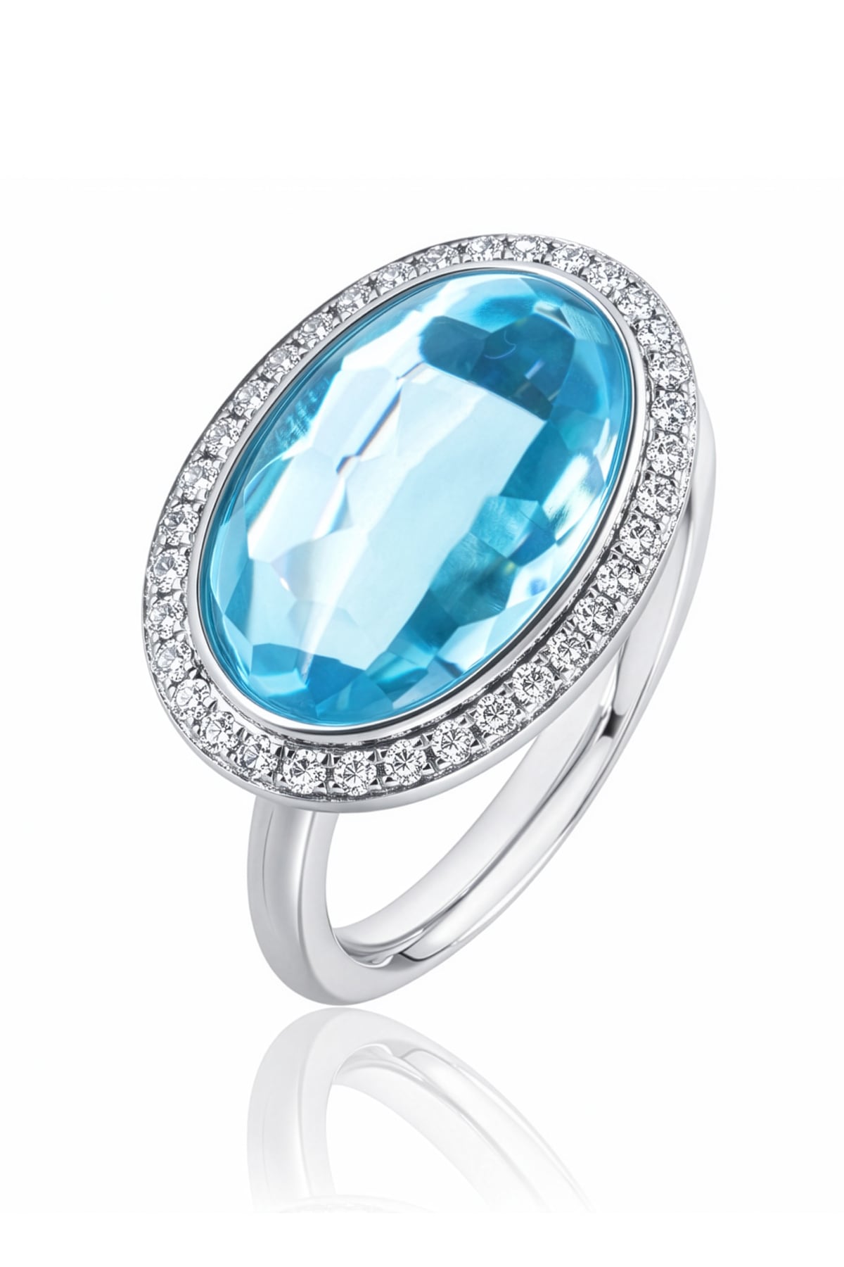 Blue Topaz & Diamond Halo Ring set in 18ct White Gold from LeGassick.