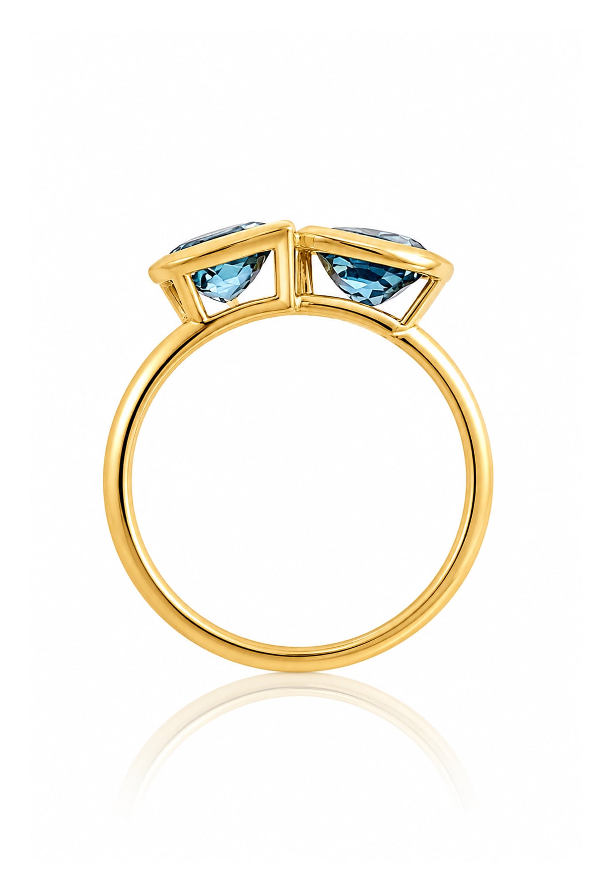 London Blue Topaz Toi et Moi Yellow Gold Ring on a white background