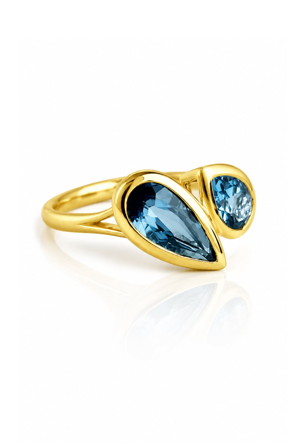 London Blue Topaz Toi et Moi Yellow Gold Ring on a white background