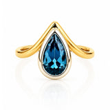 London Blue Topaz Ring in Yellow & White Gold on a white background