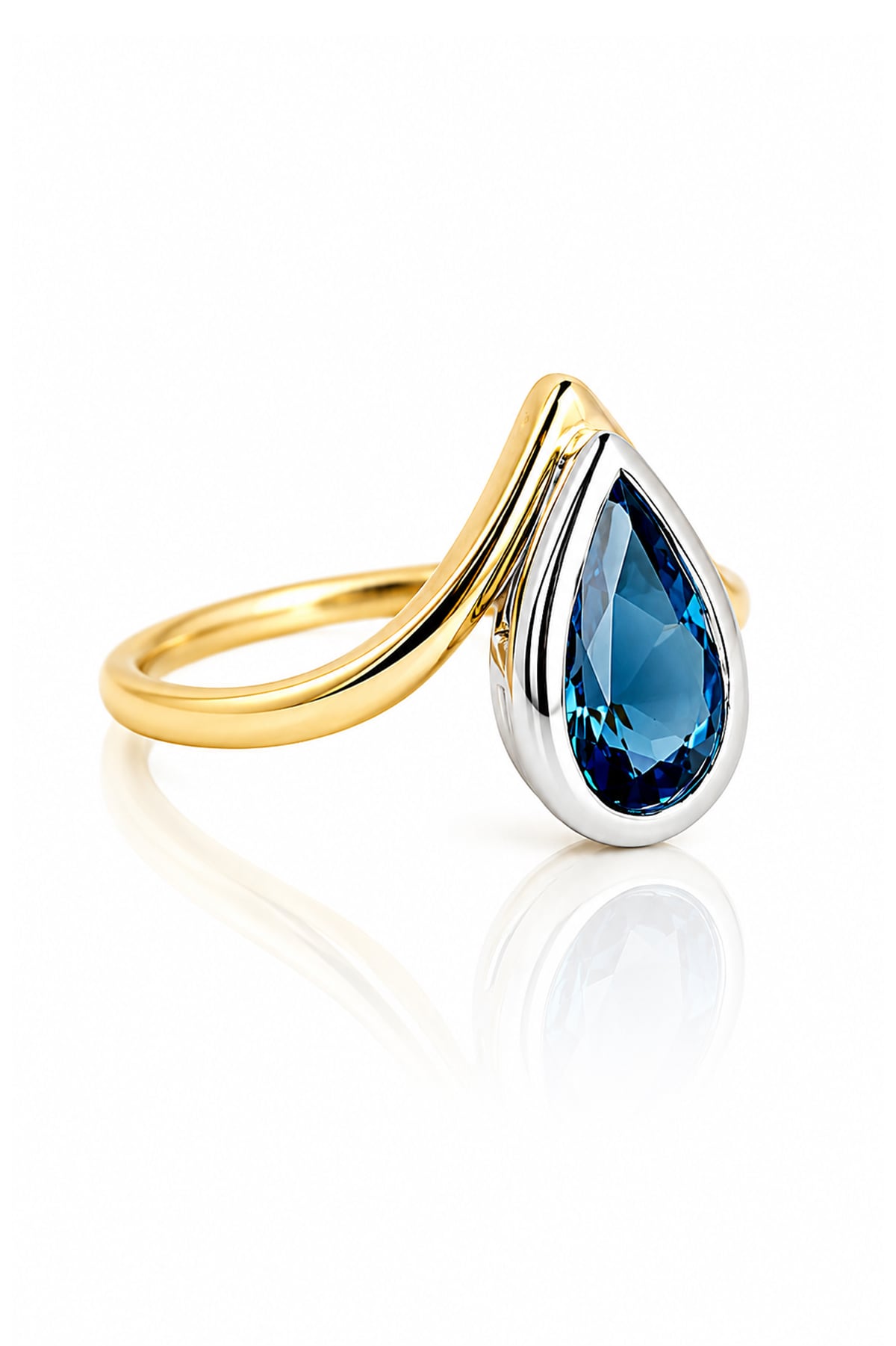 London Blue Topaz Ring in Yellow & White Gold on a white background
