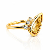 Citrine & Diamond Dress Ring in Yellow Gold on a white background