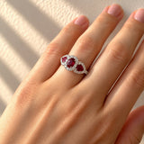 Oval & Pear Cut Ruby and Diamond Three Stone Halo Ring in White Gold