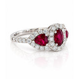 Oval & Pear Cut Ruby and Diamond Three Stone Halo Ring in White Gold