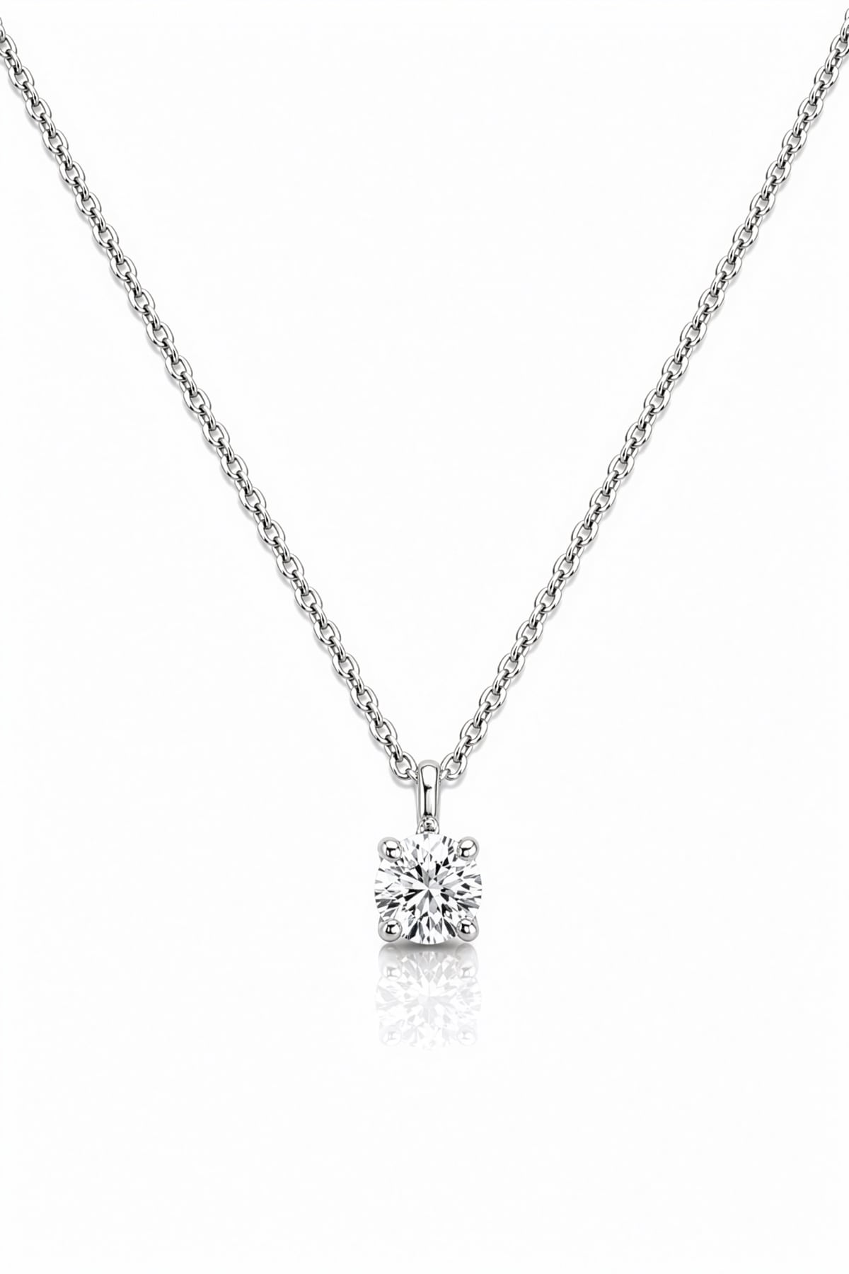 Diamond Solitaire Pendant on a white gold chain on a white background